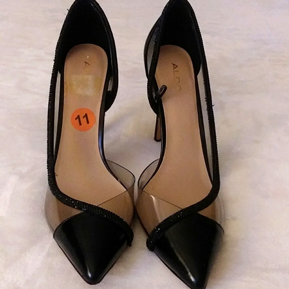 Black pair of shoe, made by Aldo, plus size 11, and very classy.